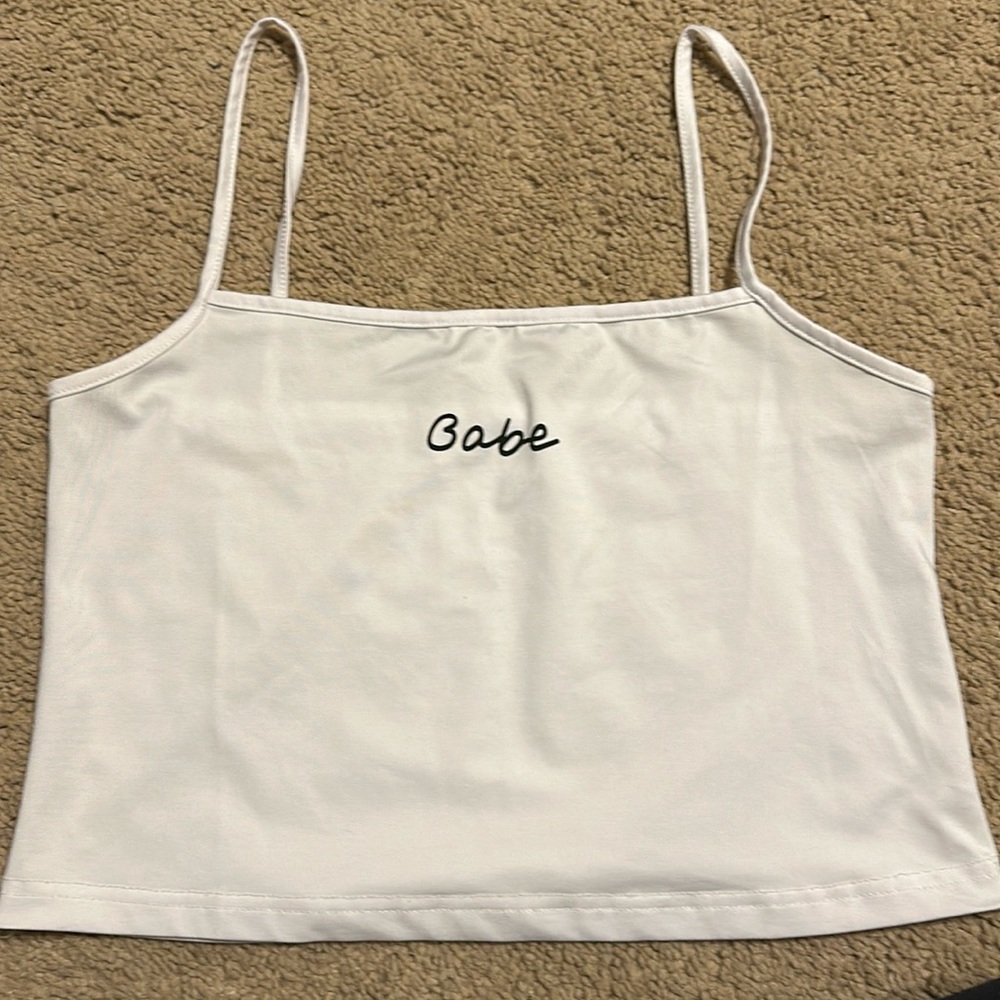 White “babe” crop tank